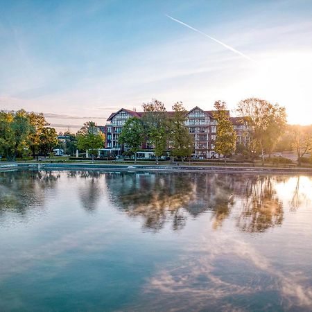 Willa Port Ostróda Exteriör bild The lake at the campus of the University of Applied Sciences and Medical University of Southern Tyrol